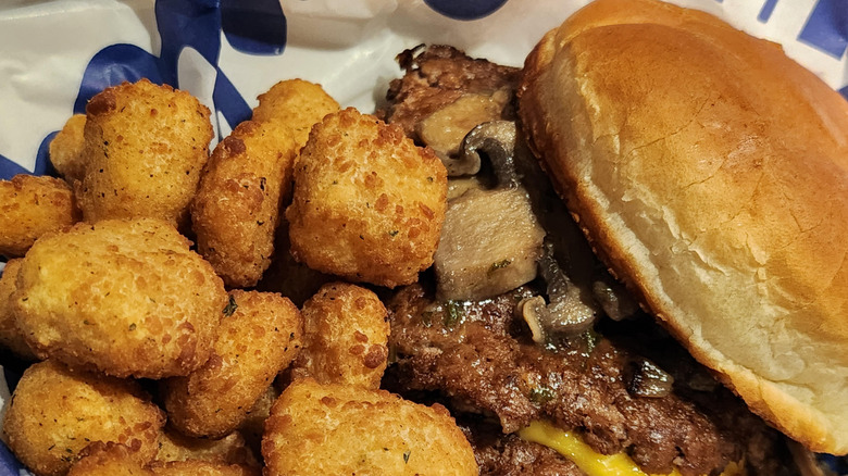 Close-up of Culver's burger mixed with cheese curds