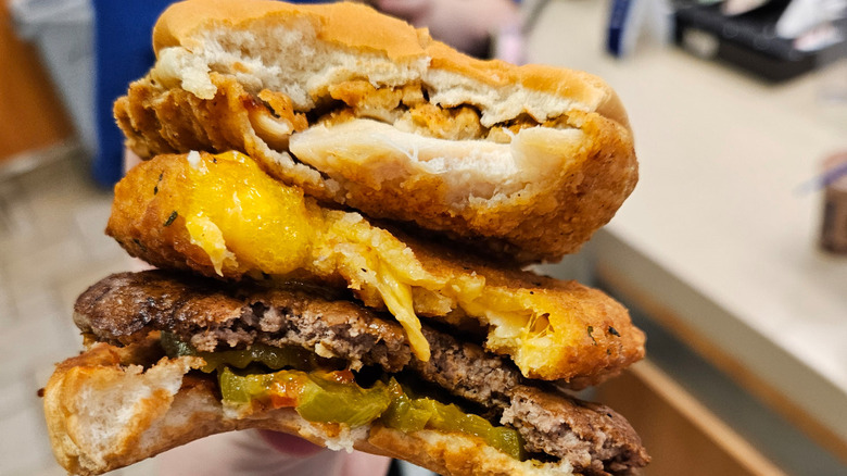 Land, Sea, and Air burger from Culver's with beef, fish, and chicken layers