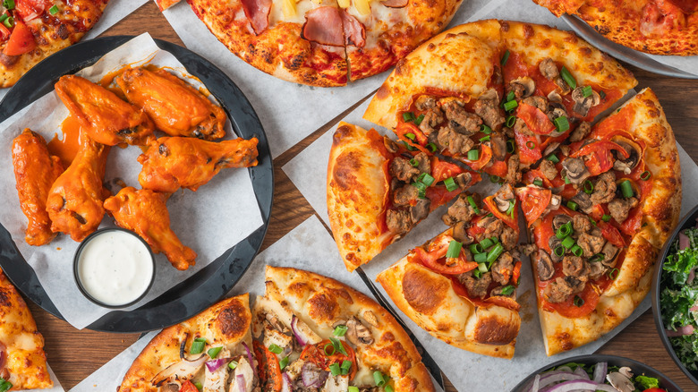 pizza pies and chicken wings