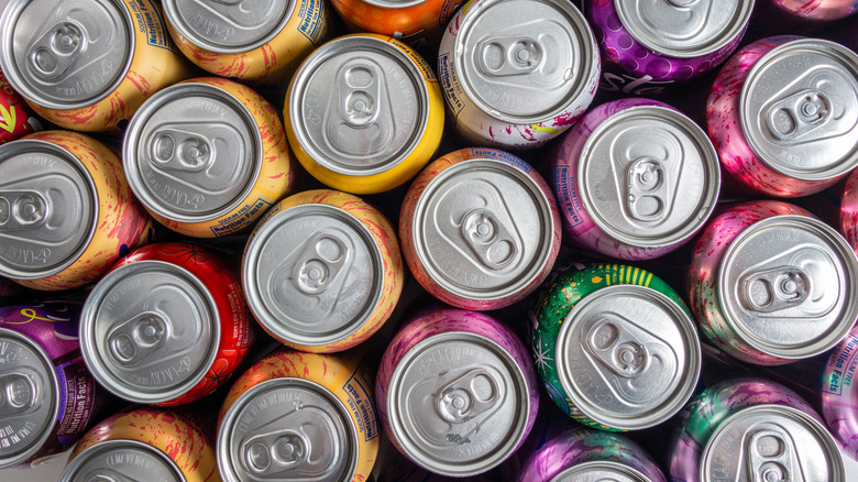 tops of colorful canned drinks