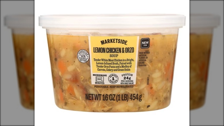 Container of lemon chicken orzo soup.