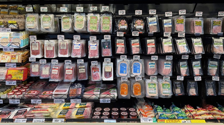 Assorted deli meats and accompaniments on display at Trader Joe's