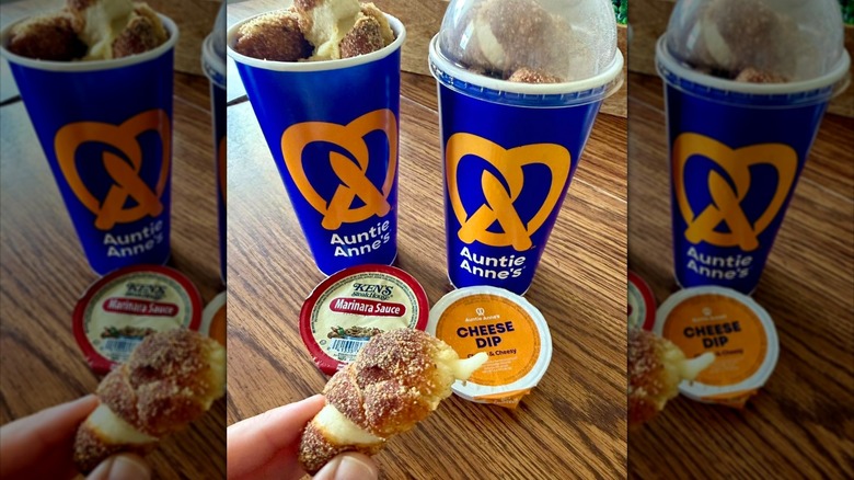 Large cups of mozzarella-stuffed pretzel nuggets with marinara and cheese dip.