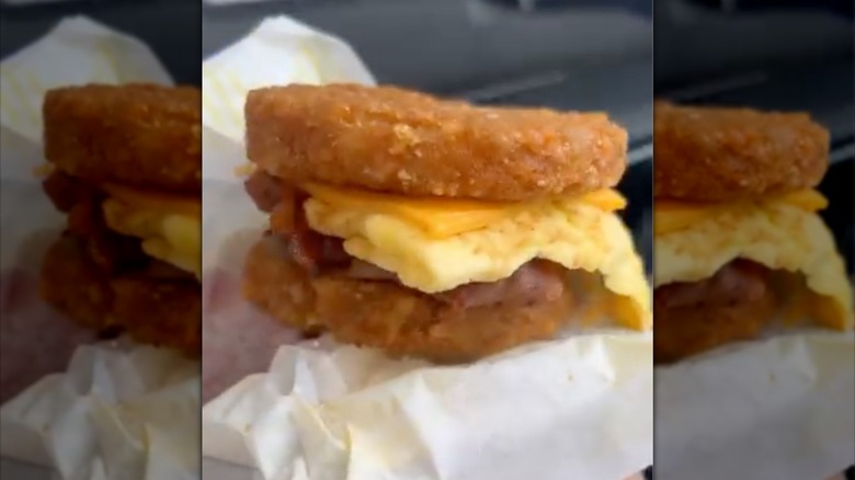 Bojangles Carolina Crunch sandwich in paper wrapper.