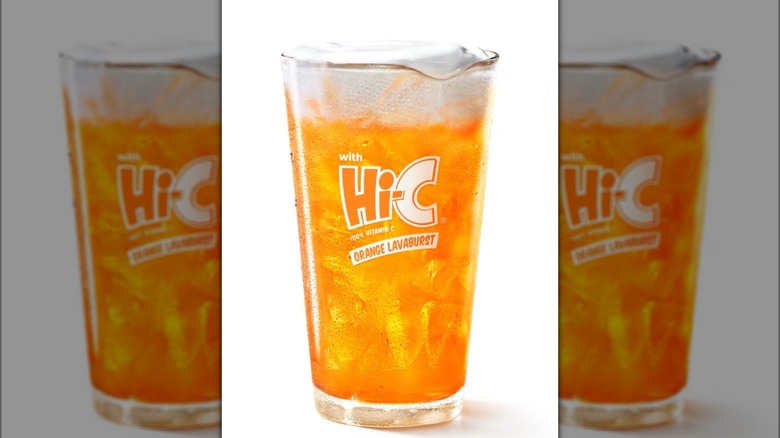Glass with orange Hi-C beverage and creamy ingredients.