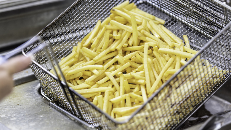 Fries in fryer basket