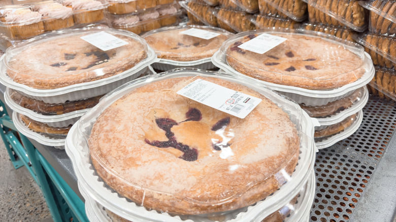 Stacks of Kirkland Signature pies on a shelf