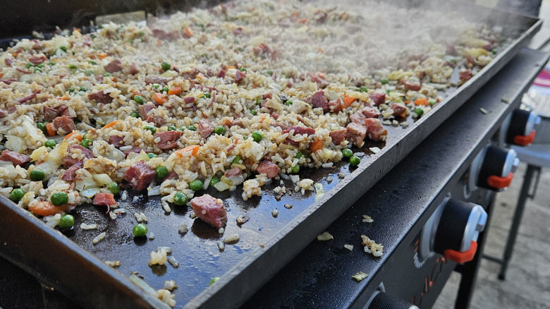 Fried rice on the cooktop surface of a Blackstone grill