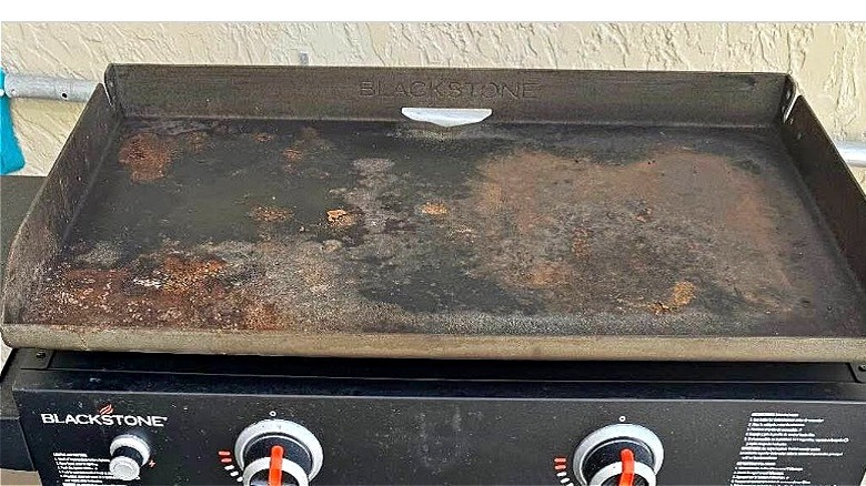 The rusty surface of a Blackstone griddle