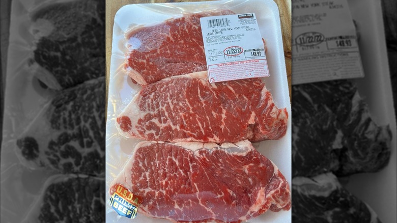 three pieces of USDA Prime New York strip steak from Costco
