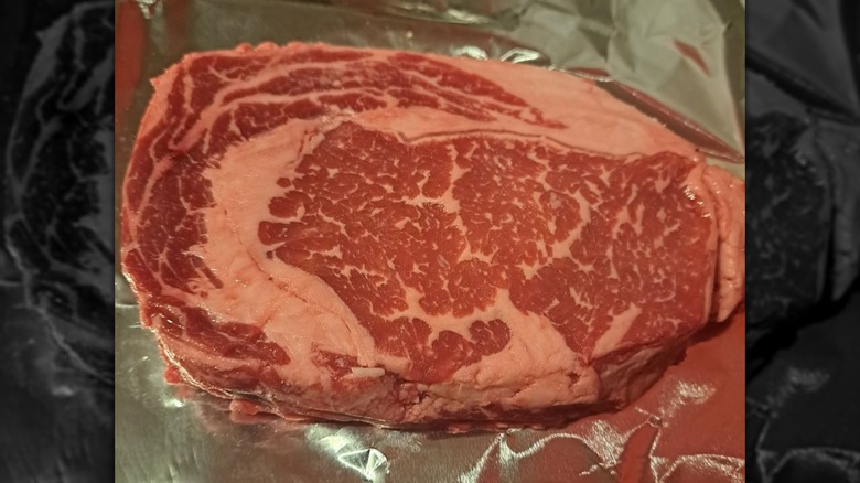 Prime ribeye steak from Kroger on tinfoil sheet