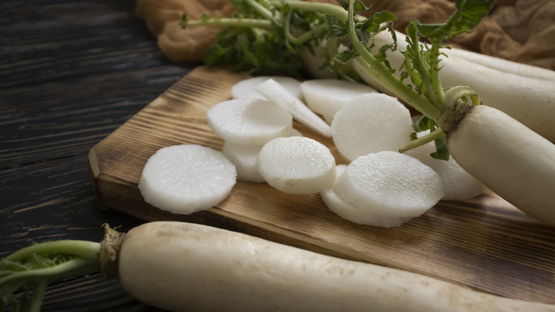 Daikon on a wooden cutting board