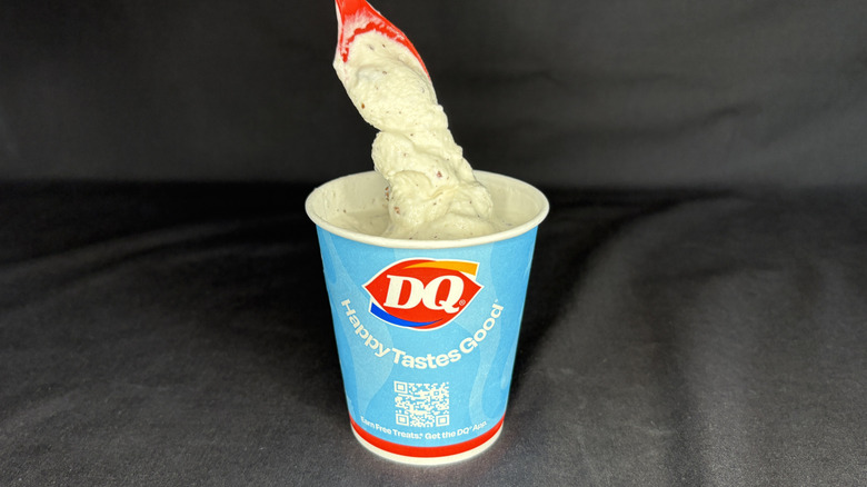 spoon taking scoop from Dairy Queen Blizzard