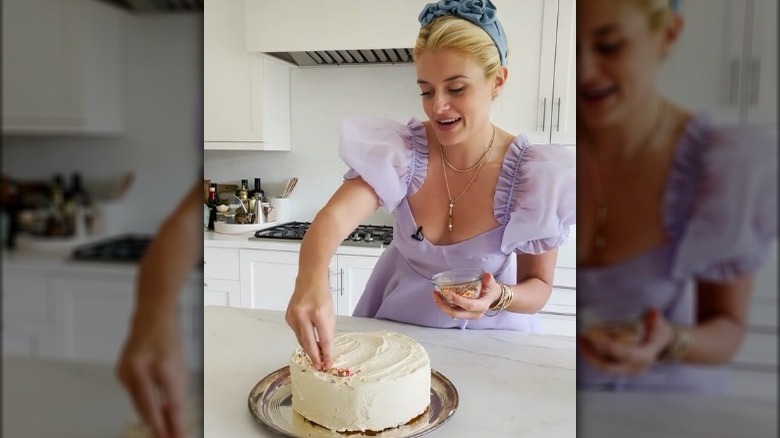 Daphne Oz decorating a cake