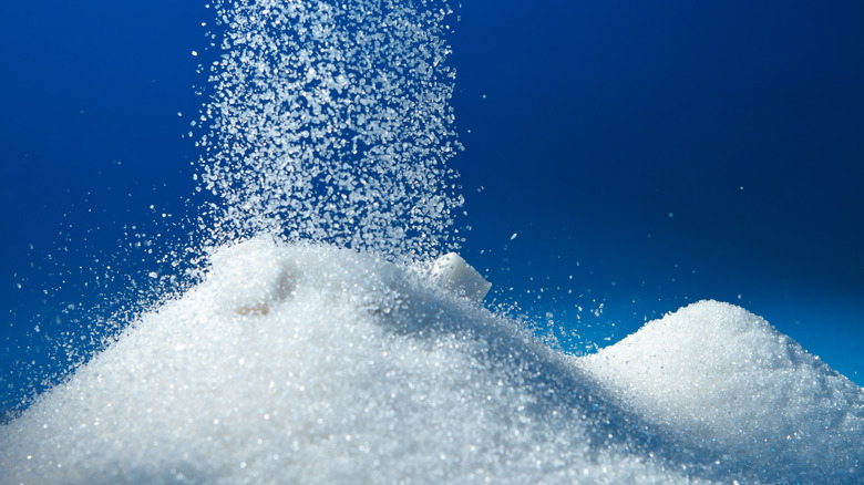 Sugar raining down on sugar piles