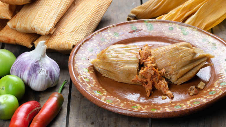Tamale on a brown plate