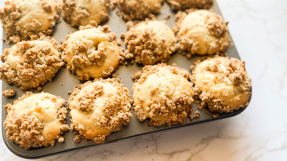 cinnamon muffins in muffin tin