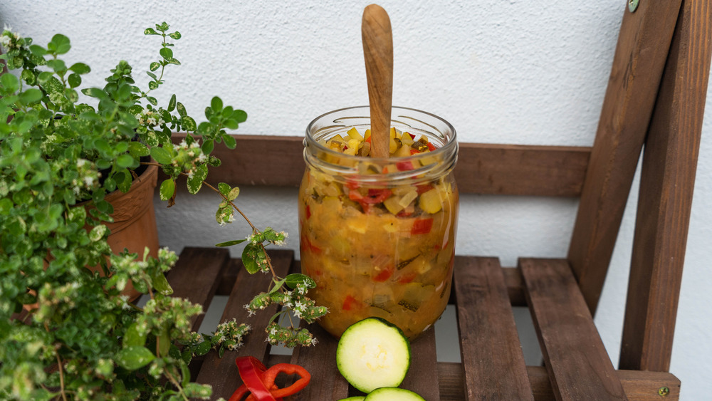 Zucchini relish by a plant