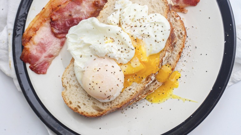 plated poached eggs on toast