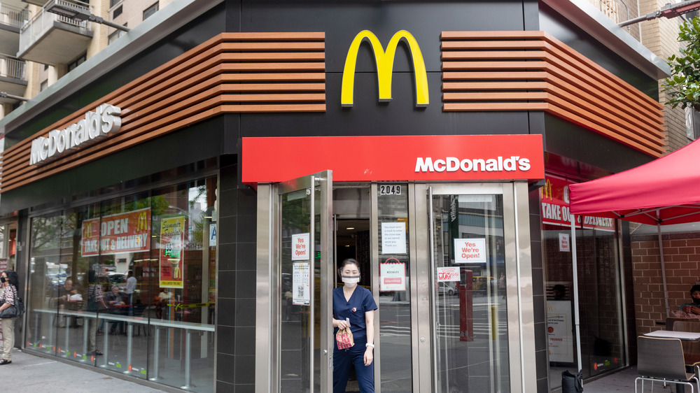 Person exiting McDonald's