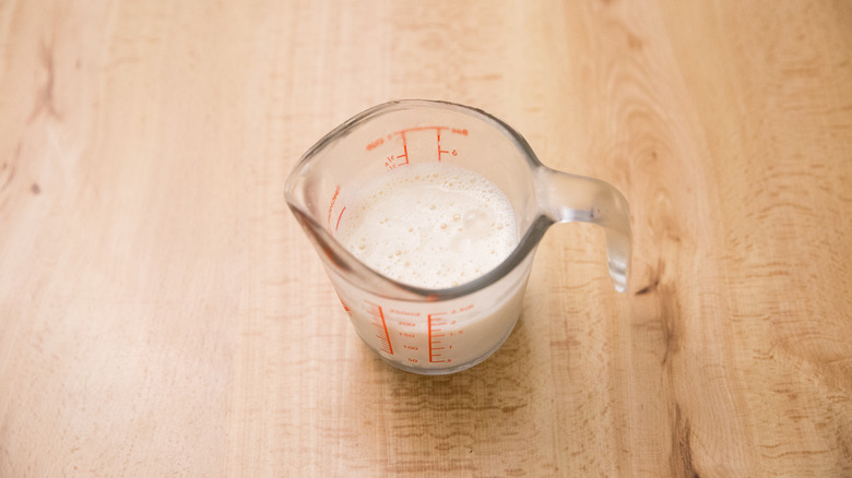 buttermilk in measuring cup