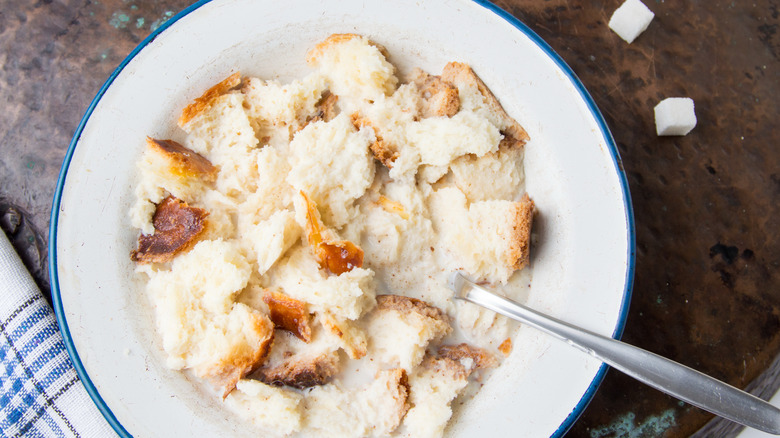 Wet chunks of bread on a plate