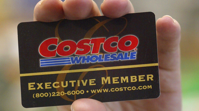 hand holding Costco membership card