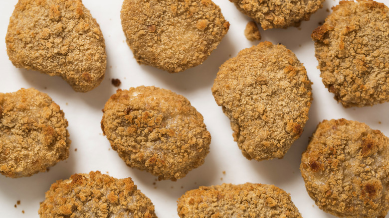 Chicken nuggets on white background