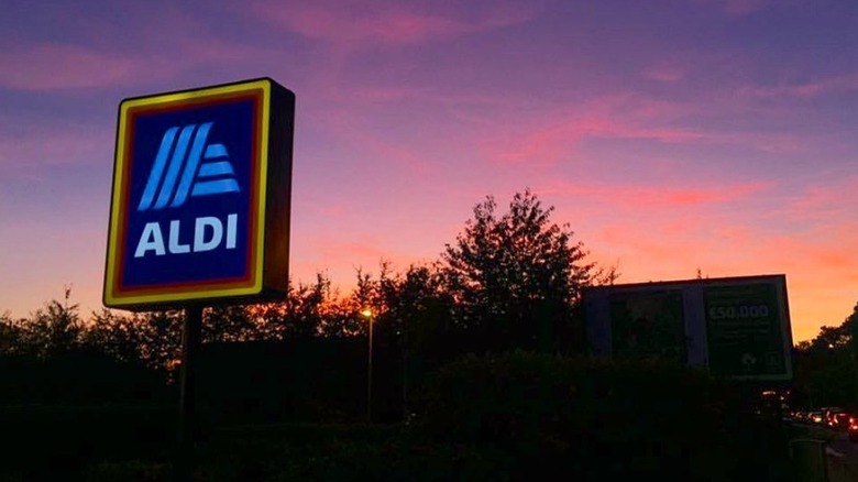 Outside of an Aldi at sunset