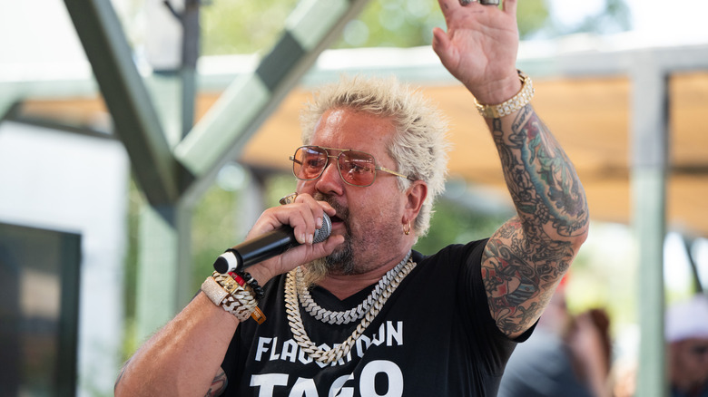 Guy Fieri on a stage