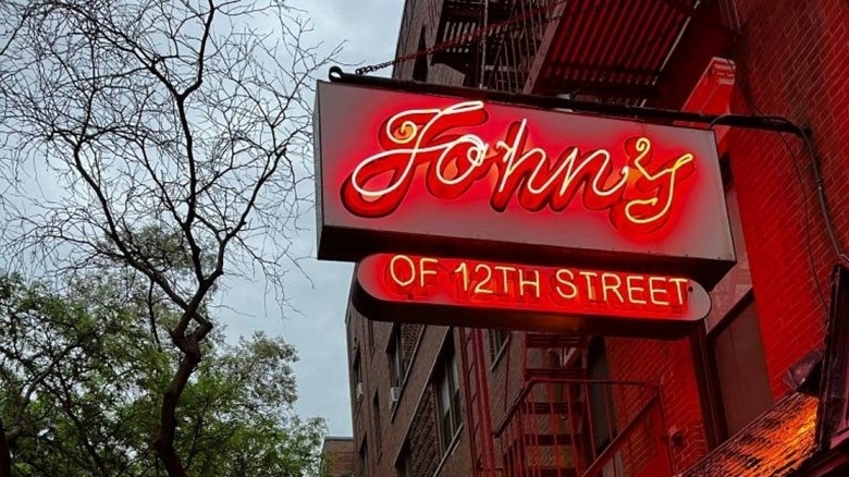 John's sign at front of store