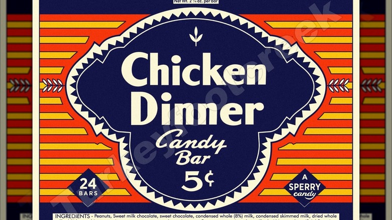 A vintage Chicken Dinner candy bar box with a bold red, yellow, and blue design