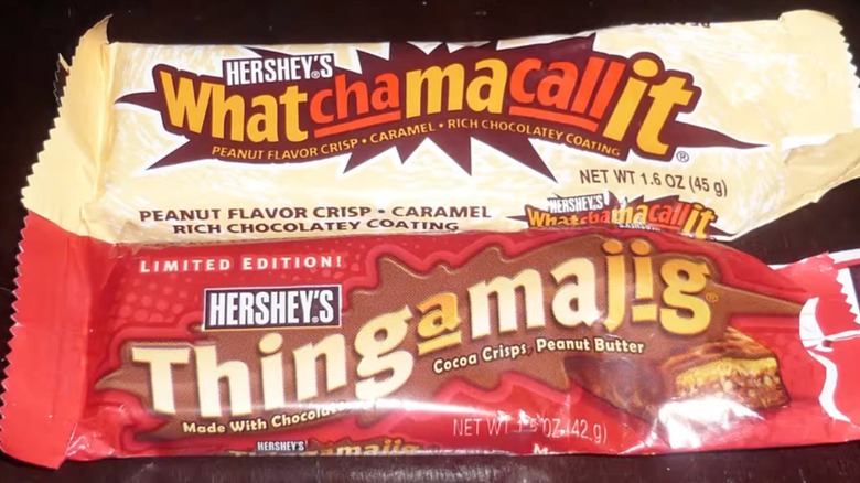 Hershey's Whatchamacallit and Thingamajig candy bar wrappers next to each other
