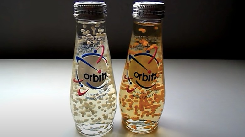 two Orbitz soda bottles