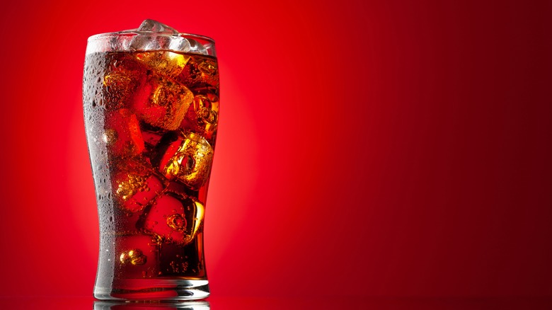 A glass of dark cola