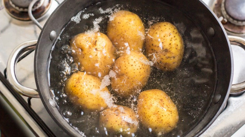 Potatoes boiling in water