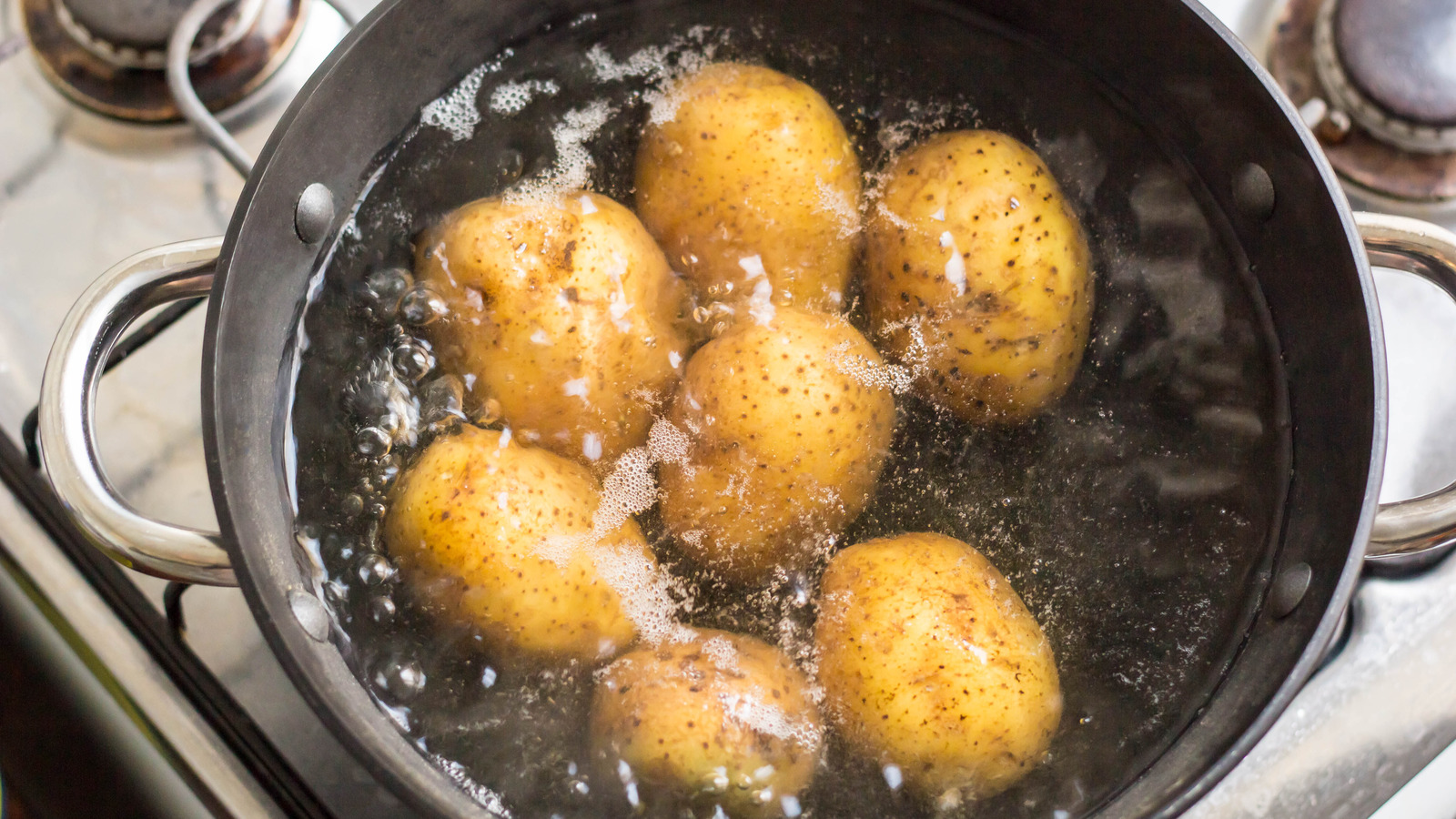 Ditch The Acidic Sauces If You Want Potatoes To Boil Quickly