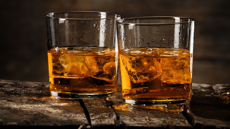 Glasses of whiskey with ice