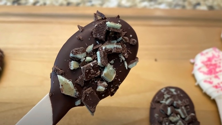 Chocolate spoon with toppings