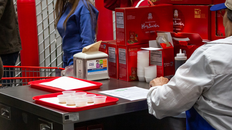 Worker hands out free samples