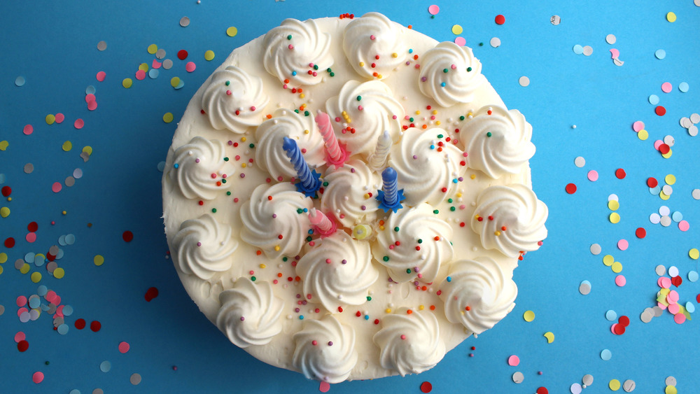Birthday cake topped with frosting