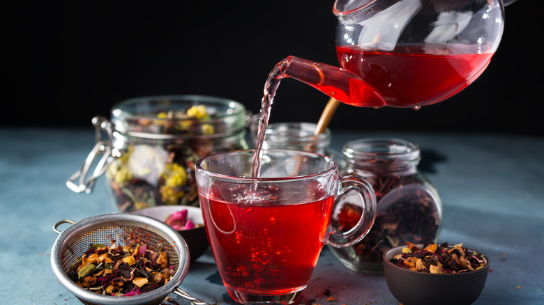 Pouring tea in cup