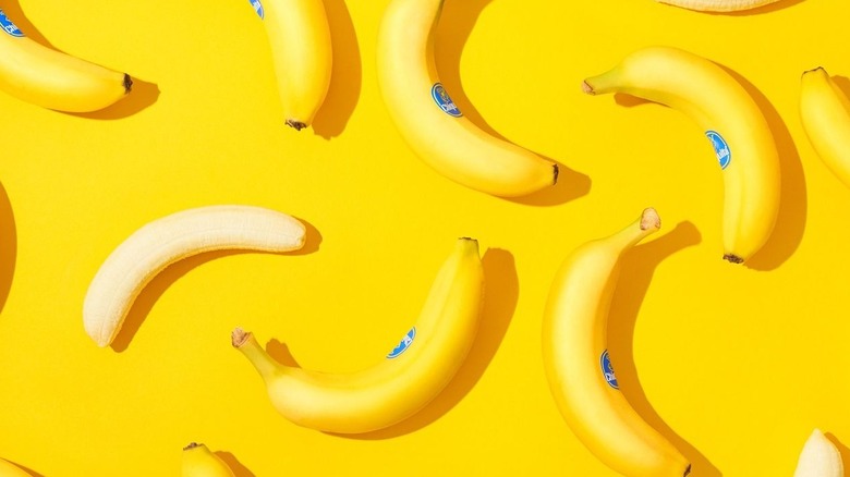 A collection of peeled and unpeeled Chiquita bananas