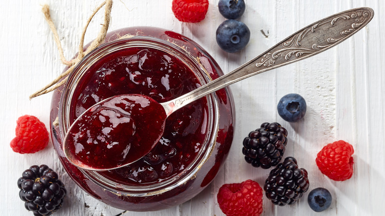 spoon resting atop jam jar