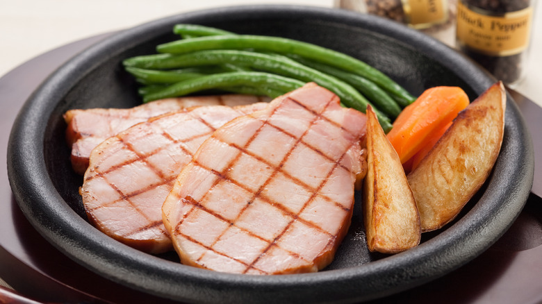 Grilled ham steak with vegetables