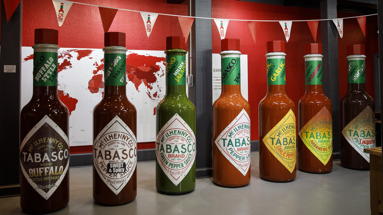 Several large bottles of Tabasco sauces