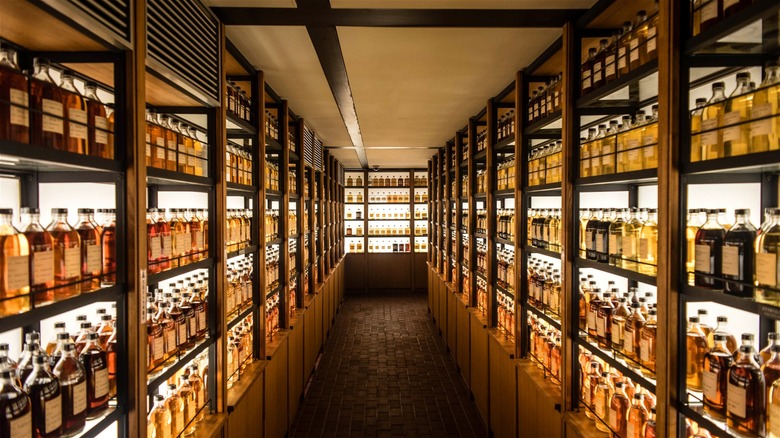 Bottles of Scotch inside a whisky cellar.