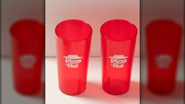 Two Pizza Hut red cups