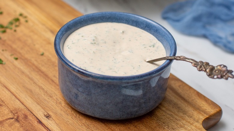 container of ranch with spoon
