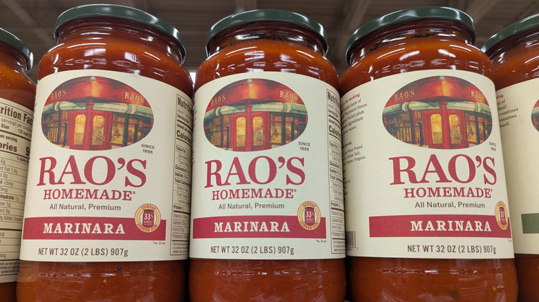 Jars of Rao's Homemade marinara sauce on store shelf.